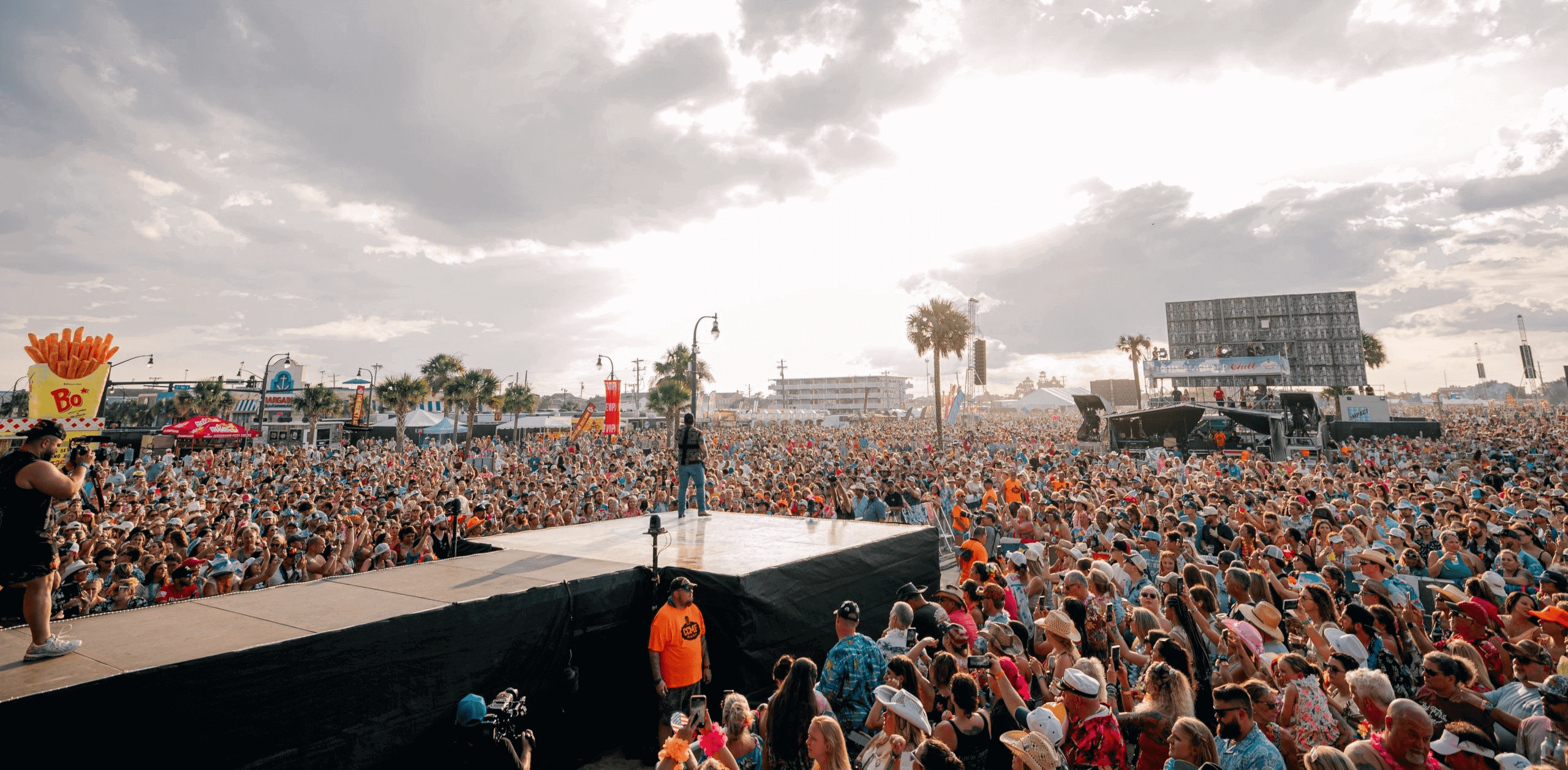 679263d22e670_CCMF-USE THIS A crowd of people standing on top of a stage.